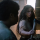 Fear Street's Kiana Madeira holds an ax as Deena Johnson while recalling the life of Sarah Fier in 1666.